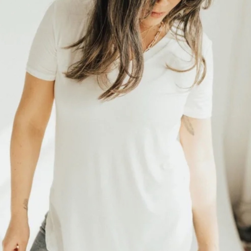 * | CJLA | white top. Size S.